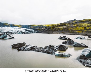 Icelandic glacier lagoon bay with icebergs flowing into the sea
