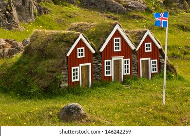 Icelandic houses with a flag of Iceland