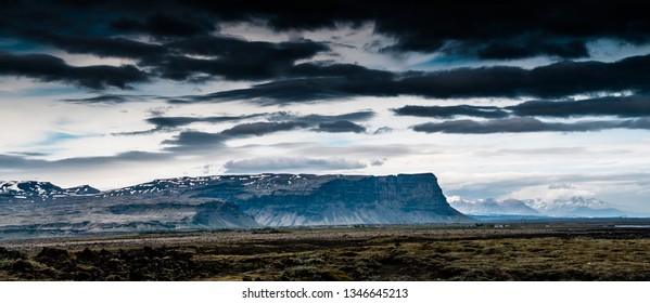 Icelandic landscape mountain with dramatic cloudy sky