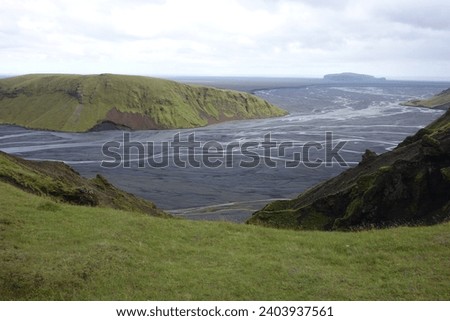Icelandic river and mountain landscape                                            