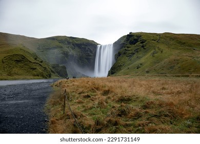 Icelandic waterfall Skógafoss on an overcast afternoon.