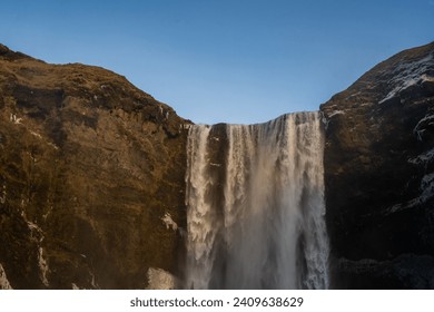 Icelandic waterfall Skogafoss in Iceland, near the Skogar, slow-motion background wallpapers. Beautiful landscape. High quality 4k footage
