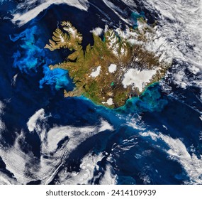 Icelands Waters Abloom. July 2019 brought the latest display of a phytoplankton bloom that occurs every year in the North Atlantic Ocean. Elements of this image furnished by NASA. - Powered by Shutterstock