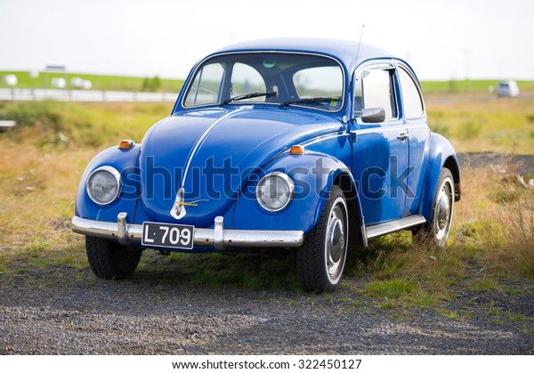 ICELAND-SEP 16, 2015: Volkswagen Beetle -\
Kaefer - Bug retro car. The Volkswagen Beetle is a two-door, four\
passenger, rear-engine economy car manufactured and marketed by\
German automaker\
Volkswagen.