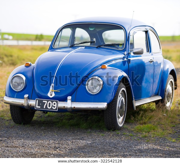 ICELAND-SEP 16, 2015: Volkswagen Beetle -\
Kaefer - Bug retro car. The Volkswagen Beetle is a two-door, four\
passenger, rear-engine economy car manufactured and marketed by\
German automaker\
Volkswagen.