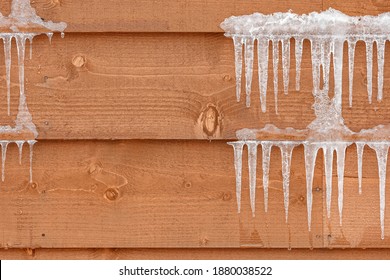 Icicle Hanging At Natural Wood Cabin Texture On A Chilly Winter Season That Show How Cold Of The Weather