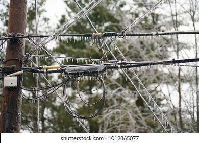 Icicle On Power Line In The Frozen Rain