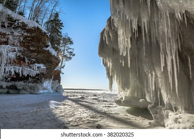 Icicle and snow-laden shoreline sandstone formations on Wisconsin's Apostle Islands National Lakeshore near Meyer's beach; Lake Superior.