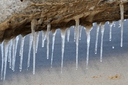 Icicles Dripping From Lighthouse Pier 