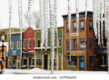 Icicles Hanging In Front Of Crested Butte, Colorado, A Small Colorful Ski Town 