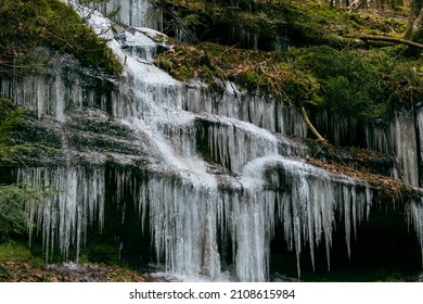 Icicles Hanging Over Cliff Edge