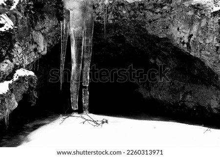 Icicles at old, water filled quartz mine - quarry called Pirunkirnu at Somero, Finland. Used somewhere between 1748-1830.