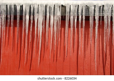 icicles on a red barn
