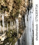Icicles on slate and rock