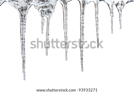 icicles which are hanging down from a roof. Isolated on white with clipping path