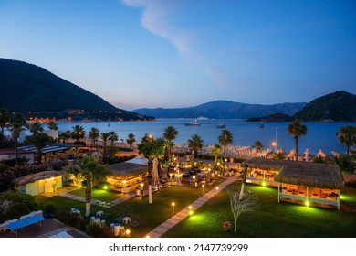 Icmeler coastline with a promenade and luxury hotels in Marmaris at twilight, Turkey 