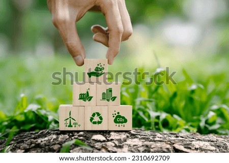 icon carbon credit or CO2 on wooden cubes. Carbon tradable certificates for Business and Environment are sustainable. industry and company Reduc of carbon emissions to Net zero greenhouse gas target.