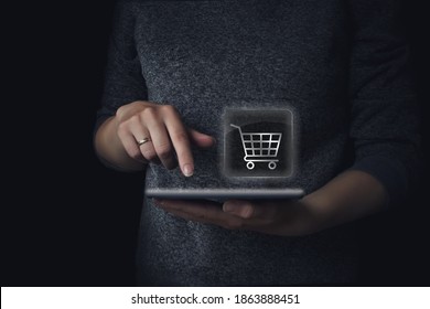 Icon Marcet Cart On Tablet In The Hand. Ordering Food Online At Home. Online Shopping Concept Tech On E-commerce . Internet Shoping Concept