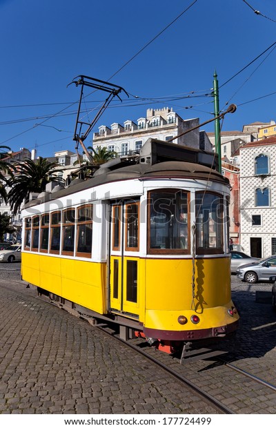 Iconic\
100 year old Lisbon yellow tram. Lisbon, Portugal\
