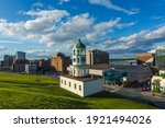 The iconic 120 year old town clock Halifax, an historic landmark of Halifax, Nova Scotia, Canada Downtown as seen from Citadel Hill overlooking the Town clock and business and residential buildings