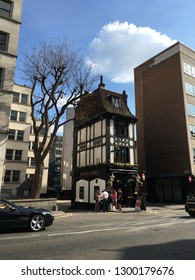 Iconic exterior of Coach and Horses (Greene King Local Pub) on Bruton Street, an old traditional tavern (bar) in Mayfair near Berkeley Square, London, United Kingdom, Europe. (May 2016)