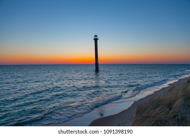 Iconic falling Kiipsaare lighthouse at sunset light, island of Saaremaa, Estonia.