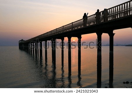 Iconic fishing bridge and logs view at Arabian sea in kuwait in early morning time