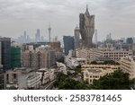 Iconic Grand Lisboa building under cloudy skies in Macau