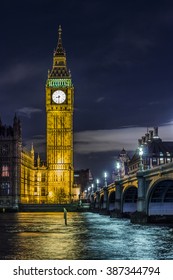 Iconic illuminated Big Ben clock face in London at night