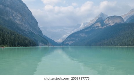 The iconic Lake Louise in summer located in Alberta, Canada with blue sky background overlooking the stunning turquoise lake. - Powered by Shutterstock