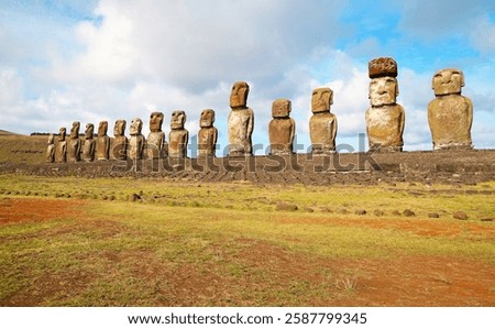 Iconic massive 15 Moai statues of Ahu Tongariki, the largest ceremonial platform on Easter Island, Chile, South America
