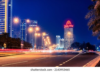 Iconic Ooredoo Tower in West bay Doha City at night with numeros lights