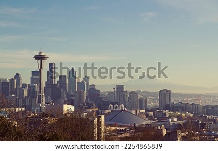 Iconic Seattle Skyline with downtown buildings and mount rainier in the distance
