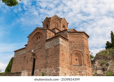 Iconic St. John at Kaneo Church, a stunning Byzantine architectural gem at Lake Ohrid in North Macedonia. Red brick facade, intricate details, and multiple domes. Beauty of this historic landmark - Powered by Shutterstock