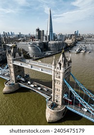 Iconic Tower Bridge Aerial drone View of Tower Bridge, Skyline. United Kingdom, UK.  Skyline of London business center the River Thames
