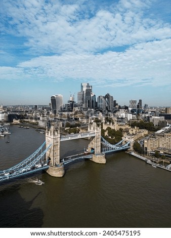 Iconic Tower Bridge Aerial drone View of Tower Bridge, Skyline. United Kingdom, UK.  Skyline of London business center the River Thames