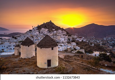 Iconic traditional wind mills in Ios island, Cyclades, Greece. - Shutterstock ID 1132673843