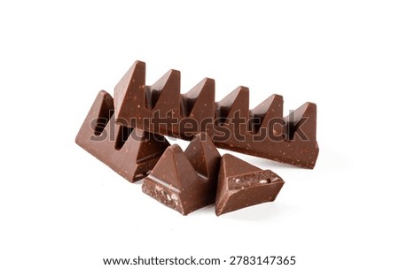 Iconic Triangular Swiss Milk Chocolate Pieces Isolated on White Background