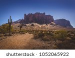 Iconic view of Superstition Mountains and Saguaro cacti in Lost Dutchman State Park, Arizona from Treasure Loop Trail