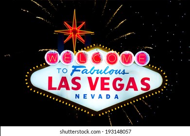 Iconic Welcome To Fabulous Las Vegas Sign With Fireworks In The Back 