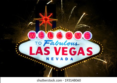 Iconic Welcome To Fabulous Las Vegas Sign With Fireworks In The Back 