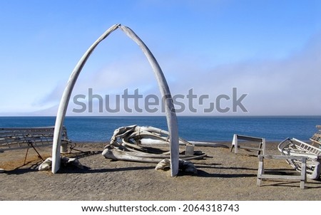 the iconic whale bone arch next to the arctic sea on a sunny summer day in the far north of barrow, alaska