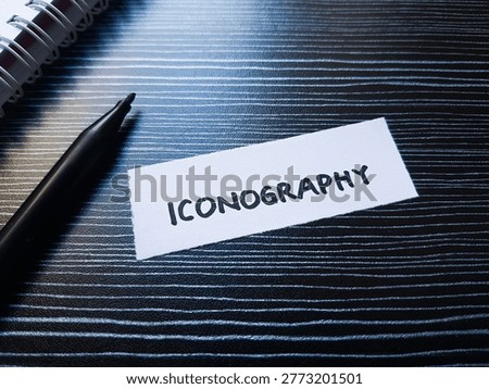 Iconography writting on table background. 