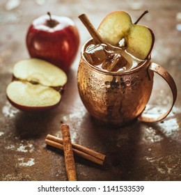 Icy Cold Moscow Mule Cocktail With Ginger Beer, Vodka, Apple And Cinnamon