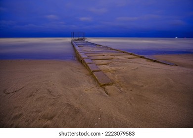 Icy Dock At Night On Lake Michigan