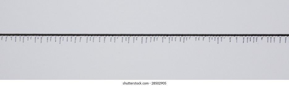 Icy Power Line After An Ice Storm In Northern Minnesota