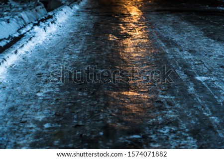 icy road night light winter