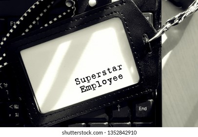 ID Staff Card On Black Keyboard With Text Written SUPERSTAR EMPLOYEE. Concept Of An Excellent Or Outstanding Talented Employee