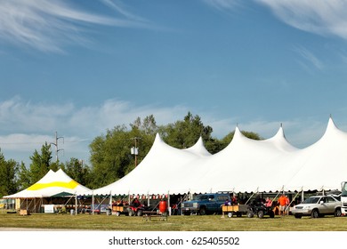 Idaho Falls, Idaho, USA June 1, 2013 The Tops Of A Series Of Party Tents Set Up For A Commercial Sales Event.