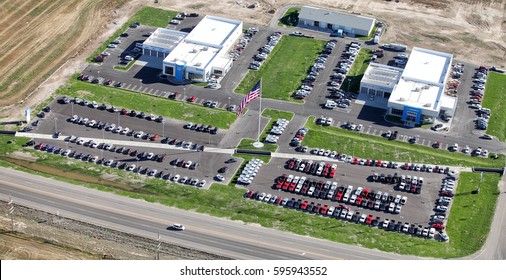 Idaho Falls, Idaho, USA Oct.3, 2014 An Aerial View Of Two New Car Dealerships, With Sales Offices, Body Shop, Maintenance Facilities, And Inventory.